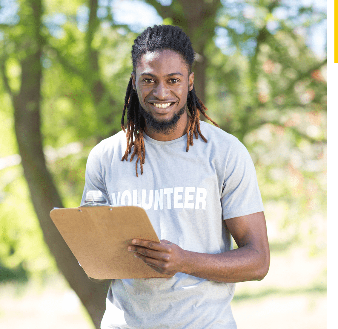Smiling volunteer with clipboard