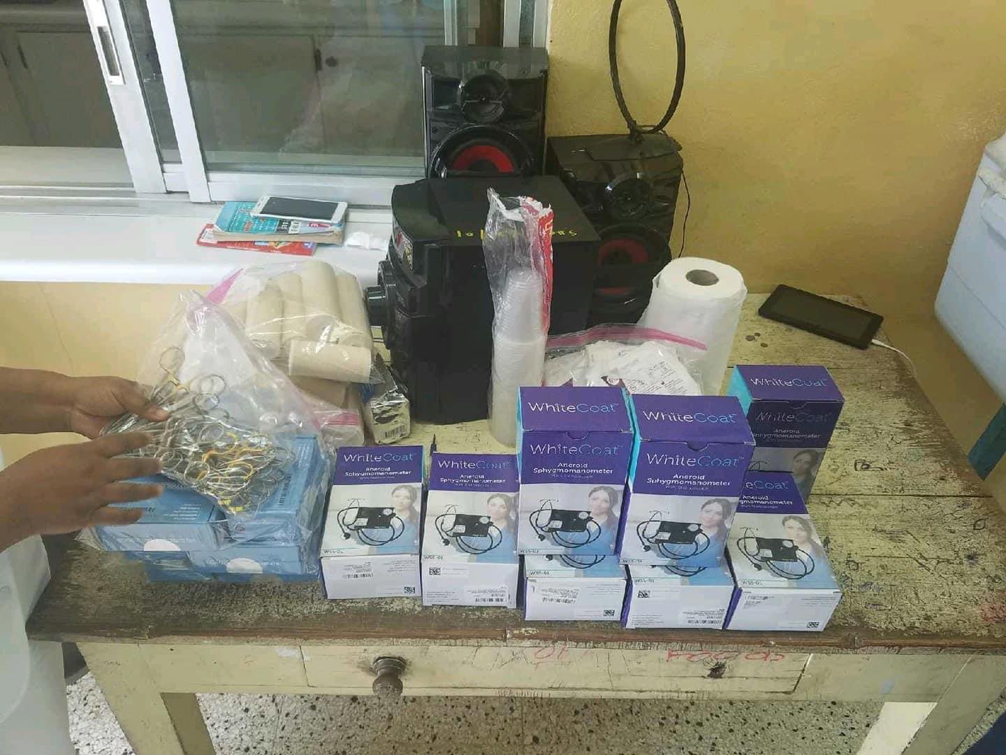 Boxes of disposable face masks on table