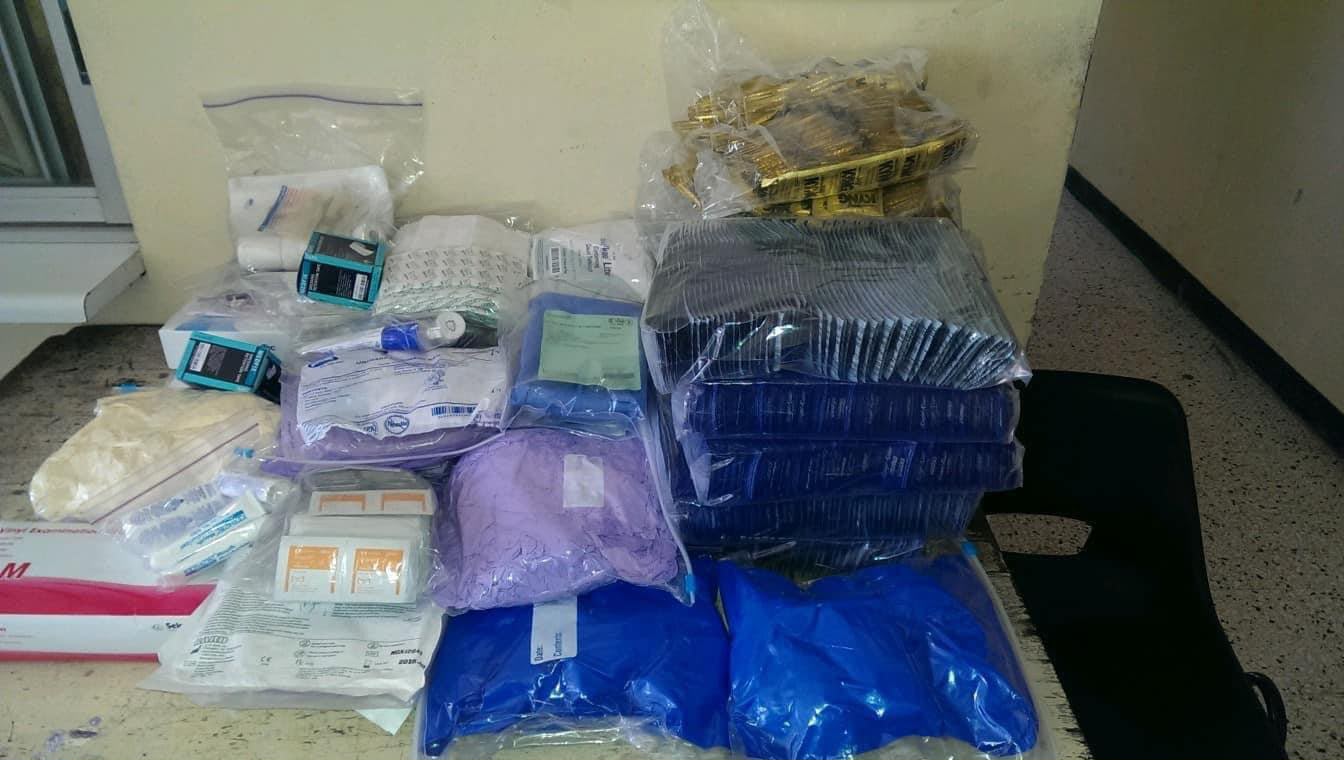Stack of plastic-wrapped packages on table