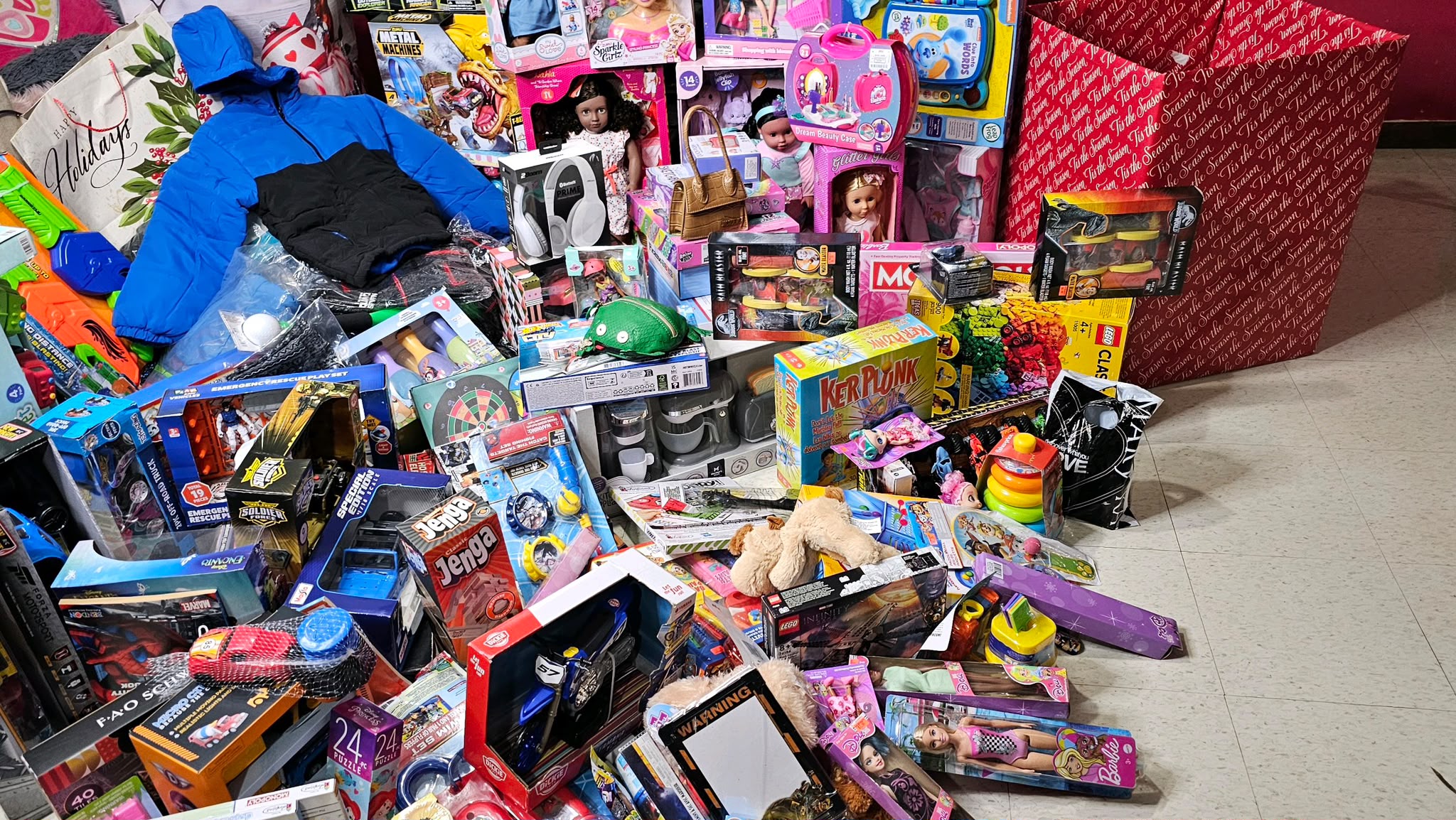 Pile of assorted toys and wrapped gifts