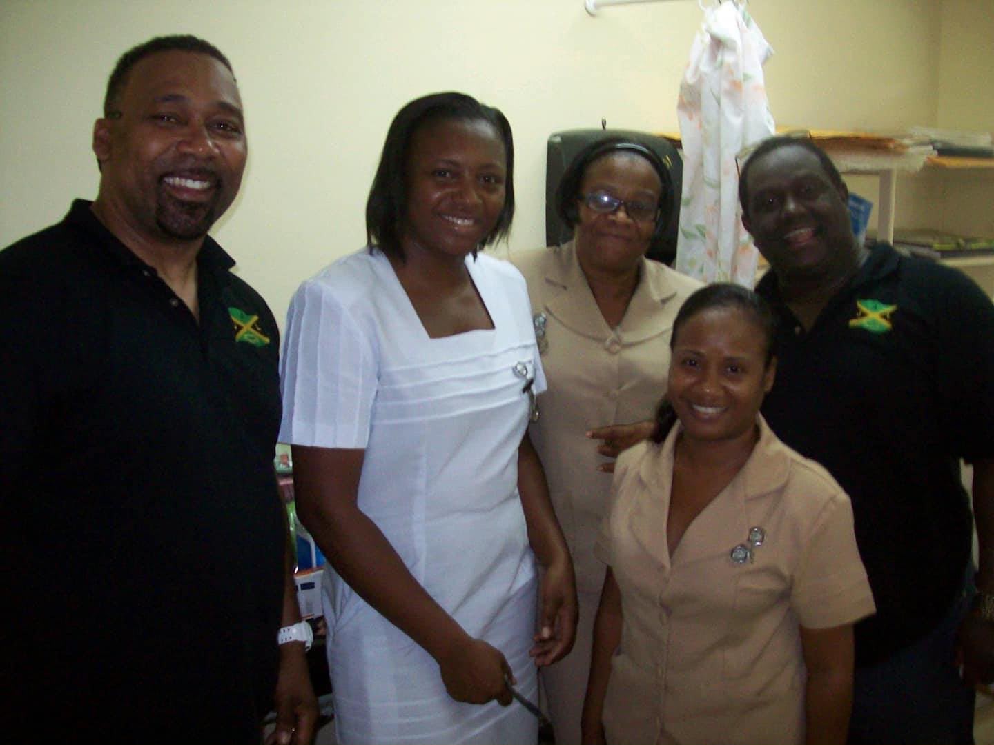 Group of smiling healthcare workers in uniforms